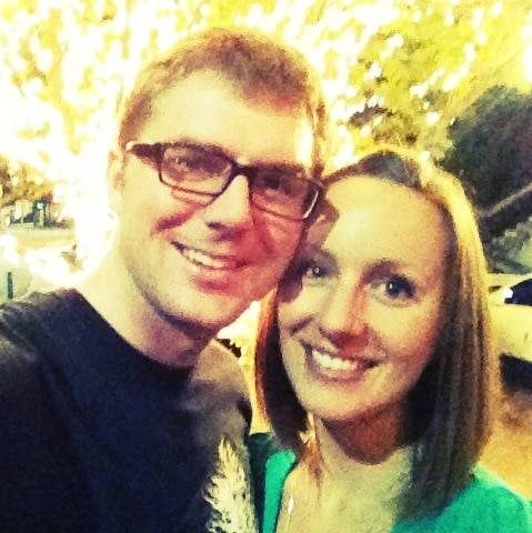 Woman and man smiling.